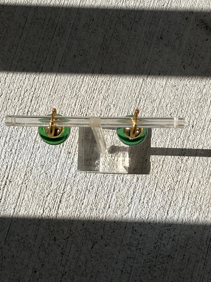 Green Potara fusion earrings with gold accents for anime fans